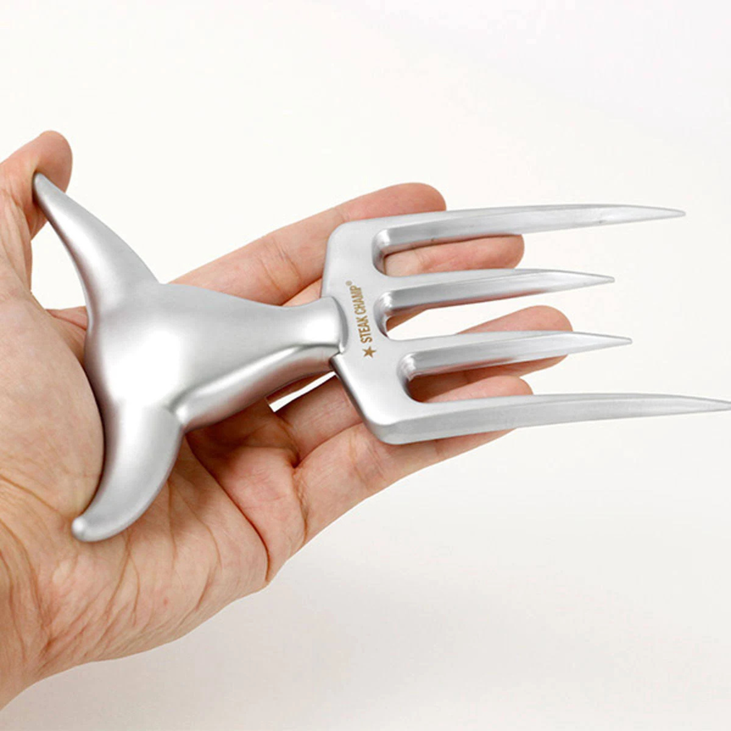 Professionele BBQ vork Steak Champ — sterk en stijlvol gereedschap voor vleesliefhebbers.