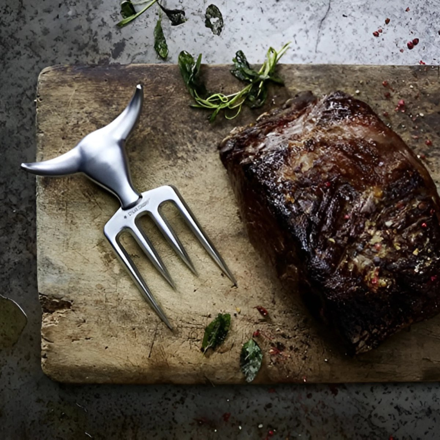 Steak Champ vleesvork — multifunctioneel gereedschap voor barbecue en keuken.