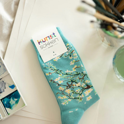 Kunstsokken als klein cadeautje — ideaal voor erbij‑present.