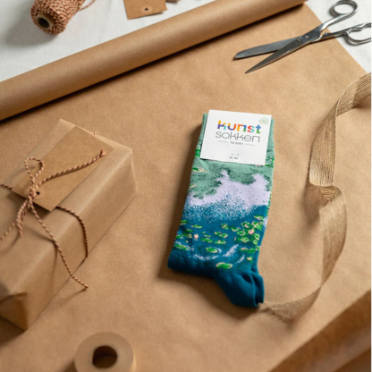 Kunstsokken cadeau-idee — klein geschenk met grote glimlach.