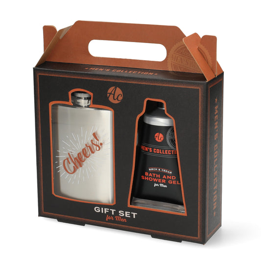 Cadeau verzorgingsset voor mannen met roestvrijstalen heupfles en Birch & Cedar showergel - perfect travel gift voor avonturiers en kroeggangers.
