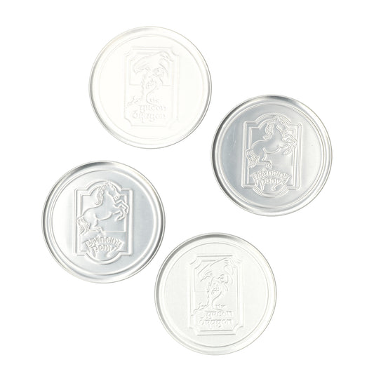 Metal LOTR drinkonderzettersset van 4 - stijlvolle tafel bescherming met iconische Tolkien symbolen en anti-slip kurk.
