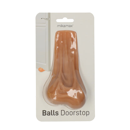 Realistisch ogende ballen deurstopper — grappig en functioneel woonaccessoire voor huis of mancave.