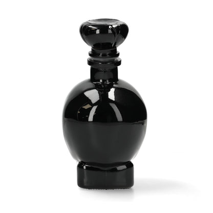Zwarte glazen doodshoofdkaraf - opvallende drankfles en eyecatcher voor whiskey, cognac en likeuren.